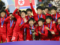 Players of Korea DPR celebrate after winning the FIFA U-20 Women's World Cup Colombia 2024 Final match between Korea DPR and Japan at Estadi...