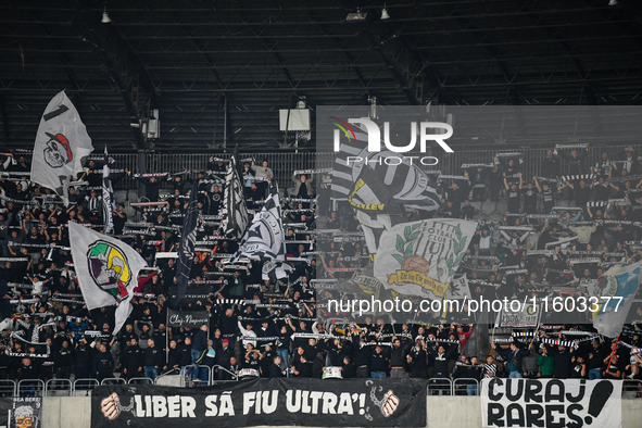 Fans of Universitatea Cluj during the match between Universitatea Cluj and Universitatea Craiova in Cluj, Romania, on September 22, 2024 