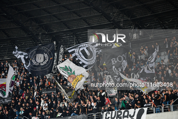 Fans of Universitatea Cluj during the match between Universitatea Cluj and Universitatea Craiova in Cluj, Romania, on September 22, 2024 