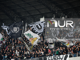 Fans of Universitatea Cluj during the match between Universitatea Cluj and Universitatea Craiova in Cluj, Romania, on September 22, 2024 (