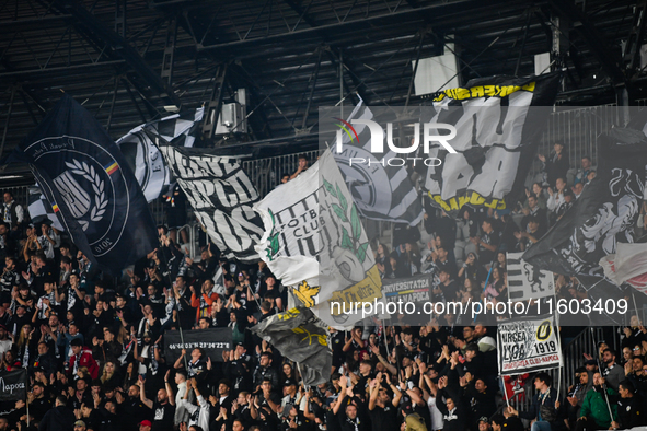 Fans of Universitatea Cluj during the match between Universitatea Cluj and Universitatea Craiova in Cluj, Romania, on September 22, 2024 