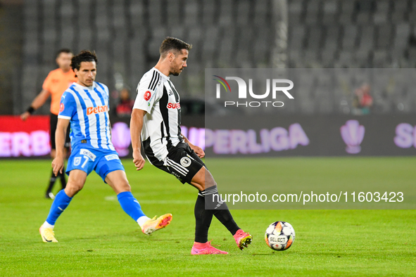 Mihaita Alexandru Chipciu is in action during the match between Universitatea Cluj and Universitatea Craiova at Cluj Arena Stadium in Cluj,...