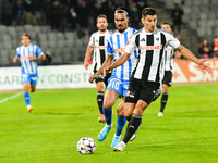 Stefan Baiaram and Lucian Iulian Cristea are in action during the match between Universitatea Cluj and Universitatea Craiova at Cluj Arena S...