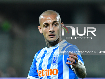 Ionut Alexandru Mitrita participates in the match between Universitatea Cluj and Universitatea Craiova at Cluj Arena Stadium in Cluj, Romani...