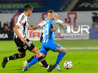 Ionut Alexandru Mitrita is in action during the match between Universitatea Cluj and Universitatea Craiova at Cluj Arena Stadium in Cluj, Ro...