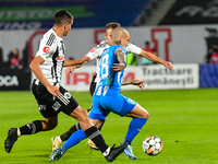 Ionut Alexandru Mitrita is in action during the match between Universitatea Cluj and Universitatea Craiova at Cluj Arena Stadium in Cluj, Ro...