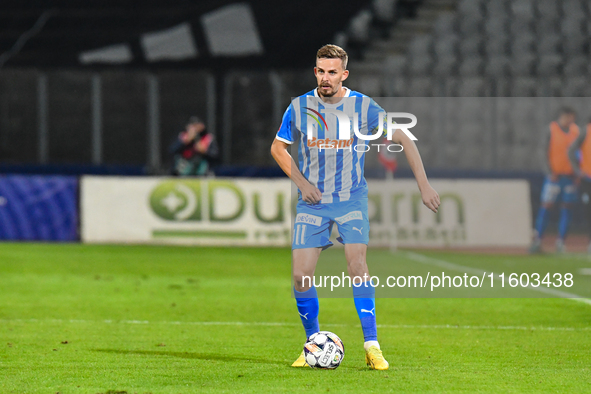 Nicusor Silviu Bancu plays during the match between Universitatea Cluj and Universitatea Craiova at Cluj Arena Stadium in Cluj, Romania, on...