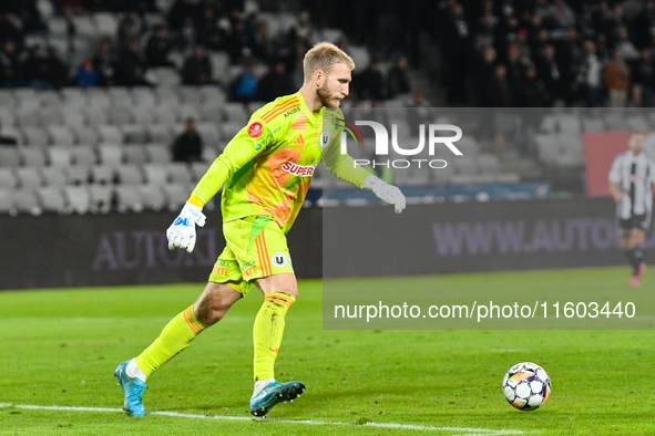 Edvinas Gertmonas is in action during the match between Universitatea Cluj and Universitatea Craiova at Cluj Arena Stadium in Cluj, Romania,...