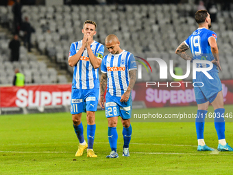 Nicusor Silviu Bancu and Ionut Alexandru Mitrita react during the match between Universitatea Cluj and Universitatea Craiova at Cluj Arena S...