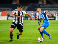 Ionut Alexandru Mitrita and Lucas Gabriel Masoero are in action during the match between Universitatea Cluj and Universitatea Craiova at Clu...