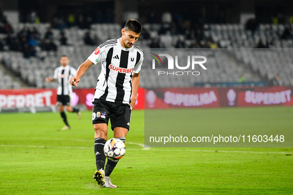 Lucian Iulian Cristea participates in the match between Universitatea Cluj and Universitatea Craiova at Cluj Arena Stadium in Cluj, Romania,...