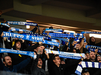 Fans of Universitatea Craiova attend the match between Universitatea Cluj and Universitatea Craiova in Cluj, Romania, on September 22, 2024...