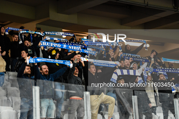 Fans of Universitatea Craiova attend the match between Universitatea Cluj and Universitatea Craiova in Cluj, Romania, on September 22, 2024 