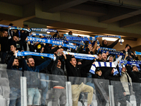 Fans of Universitatea Craiova attend the match between Universitatea Cluj and Universitatea Craiova in Cluj, Romania, on September 22, 2024...