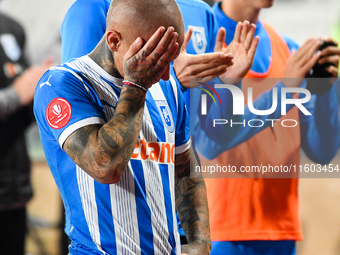 Ionut Alexandru Mitrita reacts during the match between Universitatea Cluj and Universitatea Craiova at Cluj Arena Stadium in Cluj, Romania,...