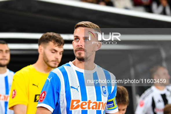 Nicusor Silviu Bancu participates in the match between Universitatea Cluj and Universitatea Craiova at Cluj Arena Stadium in Cluj, Romania,...