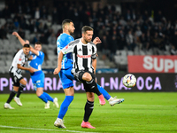 Mihaita Alexandru Chipciu and Vladimir Ionut Screciu are in action during the match between Universitatea Cluj and Universitatea Craiova at...