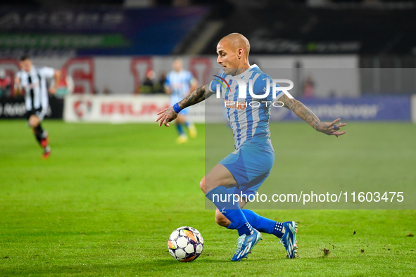 Ionut Alexandru Mitrita is in action during the match between Universitatea Cluj and Universitatea Craiova at Cluj Arena Stadium in Cluj, Ro...