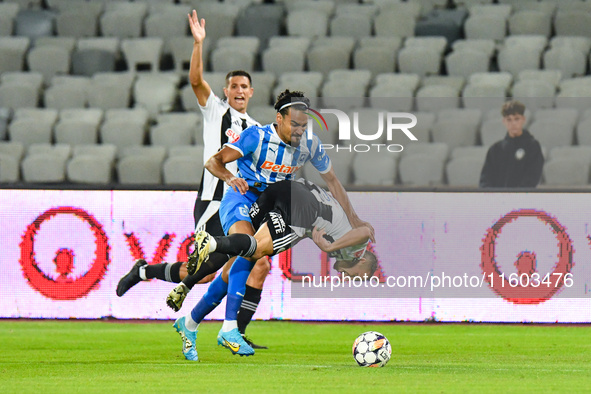 Stefan Baiaram and Robert Mihai Silaghi are in action during the match between Universitatea Cluj and Universitatea Craiova at Cluj Arena St...