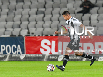 Lucas Gabriel Masoero is in action during the match between Universitatea Cluj and Universitatea Craiova at Cluj Arena Stadium in Cluj, Roma...