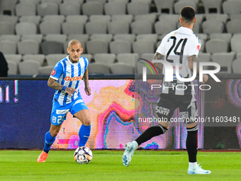 Ionut Alexandru Mitrita is in action during the match between Universitatea Cluj and Universitatea Craiova at Cluj Arena Stadium in Cluj, Ro...