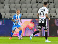 Ionut Alexandru Mitrita is in action during the match between Universitatea Cluj and Universitatea Craiova at Cluj Arena Stadium in Cluj, Ro...