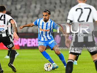 Stefan Baiaram is in action during the match between Universitatea Cluj and Universitatea Craiova at Cluj Arena Stadium in Cluj, Romania, on...