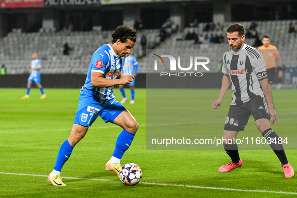 Luis Javier Paradela Diaz and Mihaita Alexandru Chipciu are in action during the match between Universitatea Cluj and Universitatea Craiova...