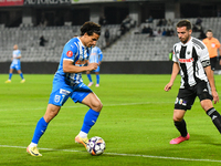 Luis Javier Paradela Diaz and Mihaita Alexandru Chipciu are in action during the match between Universitatea Cluj and Universitatea Craiova...