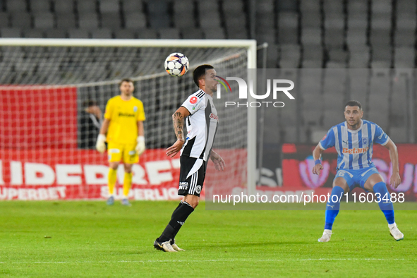 Ovidiu Alexandru BIC participates in the match between Universitatea Cluj and Universitatea Craiova at Cluj Arena Stadium in Cluj, Romania,...