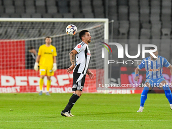 Ovidiu Alexandru BIC participates in the match between Universitatea Cluj and Universitatea Craiova at Cluj Arena Stadium in Cluj, Romania,...