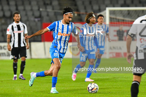 Stefan Baiaram is in action during the match between Universitatea Cluj and Universitatea Craiova at Cluj Arena Stadium in Cluj, Romania, on...