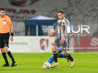 Robert Mihai Silaghi is in action during the match between Universitatea Cluj and Universitatea Craiova at Cluj Arena Stadium in Cluj, Roman...