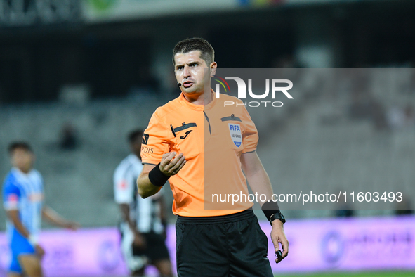 Andrei Florin Chivulete officiates the match between Universitatea Cluj and Universitatea Craiova at Cluj Arena Stadium in Cluj, Romania, on...