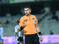 Andrei Florin Chivulete officiates the match between Universitatea Cluj and Universitatea Craiova at Cluj Arena Stadium in Cluj, Romania, on...