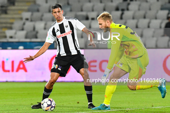 Lucas Gabriel Masoero and Edvinas Gertmonas are in action during the match between Universitatea Cluj and Universitatea Craiova at Cluj Aren...