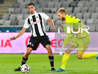 Lucas Gabriel Masoero and Edvinas Gertmonas are in action during the match between Universitatea Cluj and Universitatea Craiova at Cluj Aren...