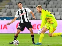 Lucas Gabriel Masoero and Edvinas Gertmonas are in action during the match between Universitatea Cluj and Universitatea Craiova at Cluj Aren...