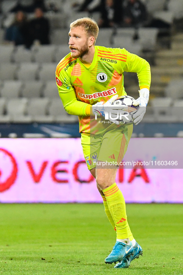 Edvinas Gertmonas is in action during the match between Universitatea Cluj and Universitatea Craiova at Cluj Arena Stadium in Cluj, Romania,...