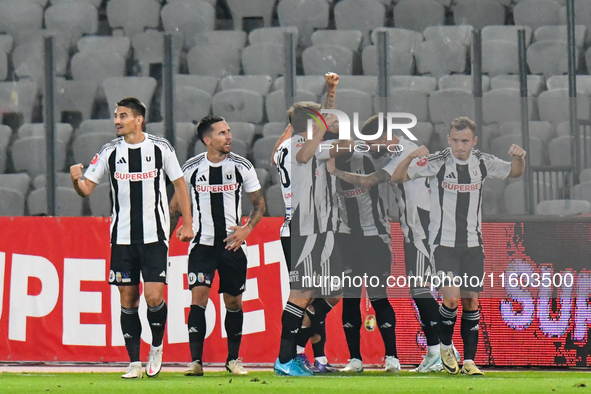 Players of Universitatea Cluj celebrate during the match between Universitatea Cluj and Universitatea Craiova at Cluj Arena Stadium in Cluj,...