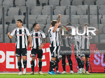 Players of Universitatea Cluj celebrate during the match between Universitatea Cluj and Universitatea Craiova at Cluj Arena Stadium in Cluj,...