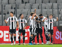 Players of Universitatea Cluj celebrate during the match between Universitatea Cluj and Universitatea Craiova at Cluj Arena Stadium in Cluj,...