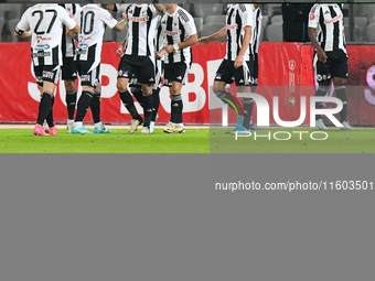 Players of Universitatea Cluj celebrate during the match between Universitatea Cluj and Universitatea Craiova at Cluj Arena Stadium in Cluj,...