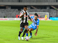 Mamadou Thiam and Stefan Baiaram are in action during the match between Universitatea Cluj and Universitatea Craiova at Cluj Arena Stadium i...