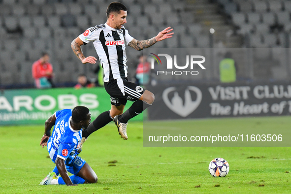 Ovidiu Alexandru Bic and Basilio Ndong Owono Nchama are in action during the match between Universitatea Cluj and Universitatea Craiova at C...