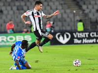 Ovidiu Alexandru Bic and Basilio Ndong Owono Nchama are in action during the match between Universitatea Cluj and Universitatea Craiova at C...