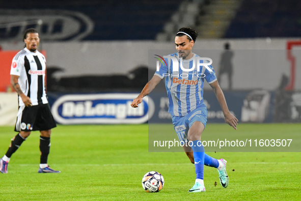 Stefan Baiaram is in action during the match between Universitatea Cluj and Universitatea Craiova at Cluj Arena Stadium in Cluj, Romania, on...