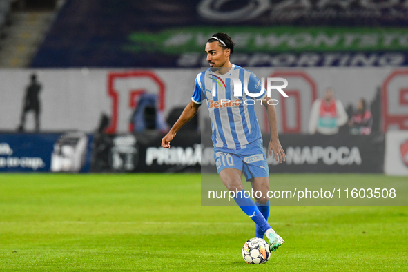 Stefan Baiaram is in action during the match between Universitatea Cluj and Universitatea Craiova at Cluj Arena Stadium in Cluj, Romania, on...