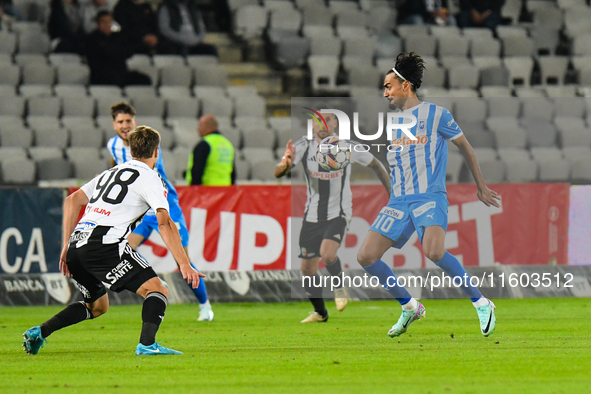 Stefan Baiaram is in action during the match between Universitatea Cluj and Universitatea Craiova at Cluj Arena Stadium in Cluj, Romania, on...