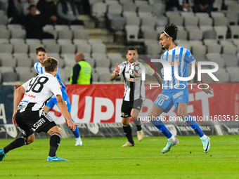 Stefan Baiaram is in action during the match between Universitatea Cluj and Universitatea Craiova at Cluj Arena Stadium in Cluj, Romania, on...